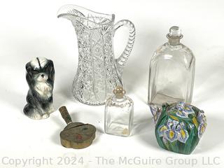 Group of Cut Crystal Pitcher, Clear Glass Bottles, Asian Enamel Ware and Porcelain Dog