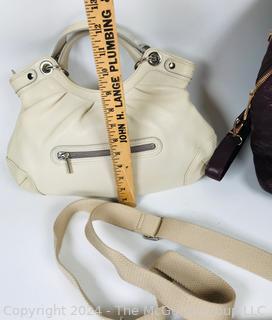 Three (3) Contemporary Handbags by DKNY and Kipling 