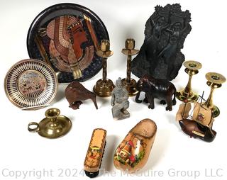 Collection of Souvenir Travel Items Including Brass Candlesticks