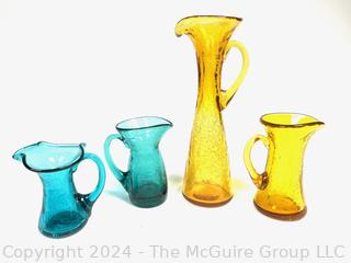 Four (4) Pieces of Blenko Art Glass Pitchers in Yellow and Blue