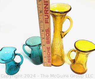 Four (4) Pieces of Blenko Art Glass Pitchers in Yellow and Blue