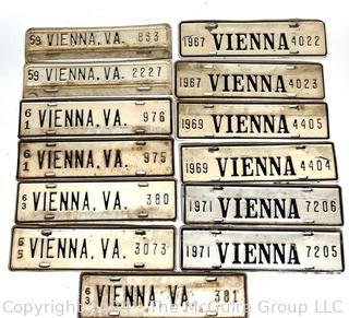 Thirteen (13) White Enamel Painted Vienna Virginia Car License Plate, 1958-1971