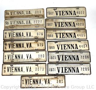 Thirteen (13) White Enamel Painted Vienna Virginia Car License Plate, 1958-1971