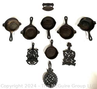 Cast Iron Trivets and Pan Shaped Ashtrays,  Wagner-Ware 