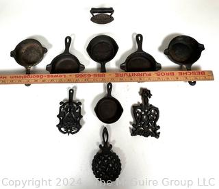 Cast Iron Trivets and Pan Shaped Ashtrays,  Wagner-Ware 