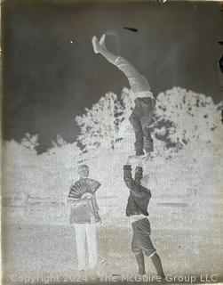 Antique Glass Photo Negative Plates, circa 1900 with Original Annotated Envelopes. Includes photos from Atlantic Beach NJ, Acrobats and Film Photographs