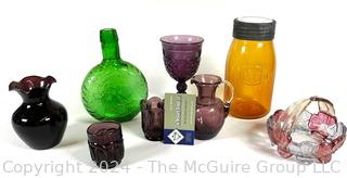 Collection of Colored Glassware Including Amethyst Glass Wedding Ring Toothpick Holder, Ball Amber Buffalo Jar & Westmoreland Dogwood Candy Basket.