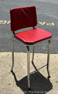 Red Vinyl and Chrome Kitchen Stool.  34" tall.