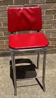 Red Vinyl and Chrome Kitchen Stool.  34" tall.