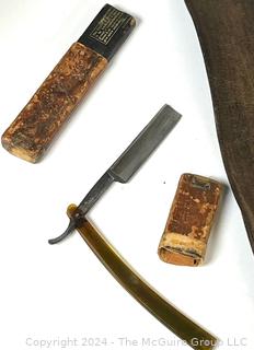 Sunasak's Dry Hone Leather Razor Strap  and Straight Razor. Two Shoe Polish Tins