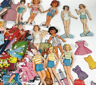 Collection of Cut Paper Dolls and Clothes.