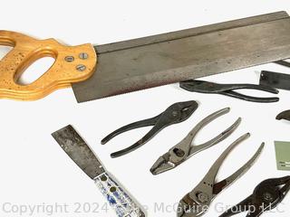 Hand Tools Including Pliers, Files, Chisels, and a Saw