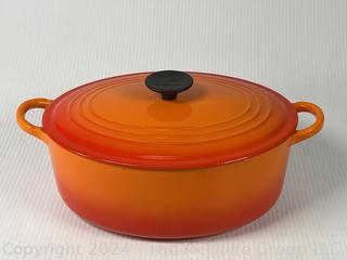 Orange Le Creuset Enameled Cast Iron Oval Dutch Oven