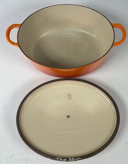 Orange Le Creuset Enameled Cast Iron Oval Dutch Oven