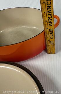 Orange Le Creuset Enameled Cast Iron Oval Dutch Oven