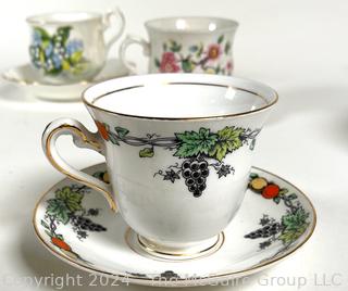 Nine (9) Porcelain Teacups and Saucers, Mixed Patterns