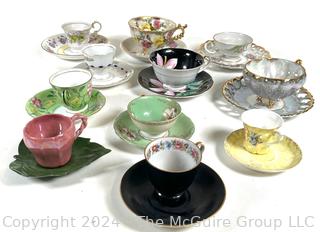 Eleven (11) Teacups and Saucers in Mixed Patterns 