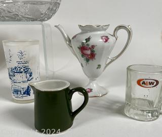 Group of Decorative Items Including Porcelain Teapots, Crystal Dish, and Toby Mug