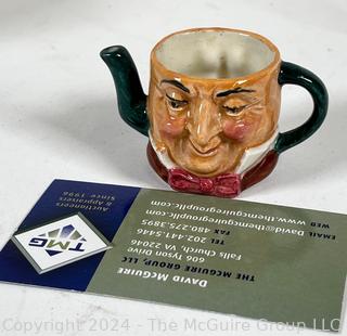 Group of Decorative Items Including Porcelain Teapots, Crystal Dish, and Toby Mug