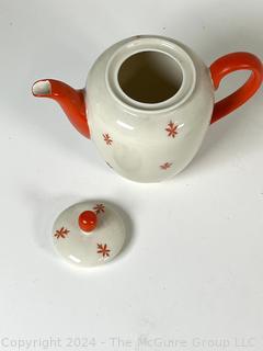 Group of Decorative Items Including Porcelain Teapots, Crystal Dish, and Toby Mug