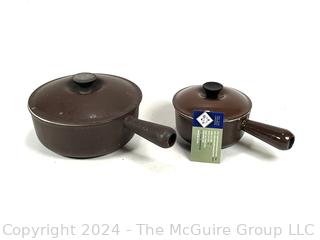 Two (2) Brown Le Creuset Enameled Cast Iron Sauce Pots with Lids