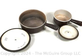 Two (2) Brown Le Creuset Enameled Cast Iron Sauce Pots with Lids