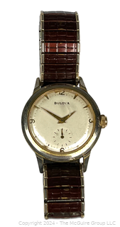 Men's Bulova Wristwatch with Speidel Band. Separate Second Hand; 12,3,6,9 Numerals.