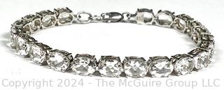 Prong Set Cubic Zirconia in Sterling Silver Tennis Bracelet Signed by GIE. 14g