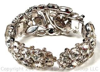 Rhinestone Encrusted Clamp Bracelet Signed Weiss.  Missing stone on back. 