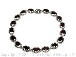 Inset Oval Garnet in Sterling Silver Tennis Bracelet.