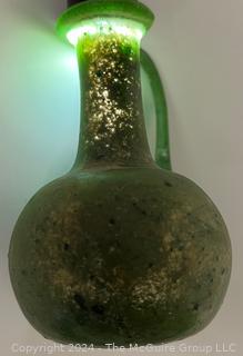 Small Green Blown Glass Pitcher, Possibly of Roman Origin, Lacking Provenance.  3 1/2" tall