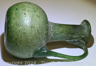 Small Green Blown Glass Pitcher, Possibly of Roman Origin, Lacking Provenance.  3 1/2" tall