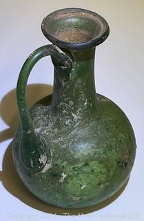 Small Green Blown Glass Pitcher, Possibly of Roman Origin, Lacking Provenance.  3 1/2" tall