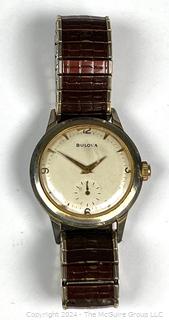 Men's Bulova Wristwatch with Speidel Band. Separate Second Hand; 12,3,6,9 Numerals.