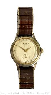 Men's Bulova Wristwatch with Speidel Band. Separate Second Hand; 12,3,6,9 Numerals.