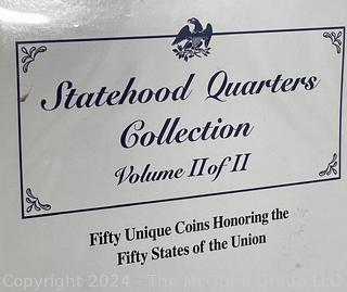 Two (2) Volume Books with Statehood Quarters and Stamps by the Postal Commemorative Society. Missing two states.