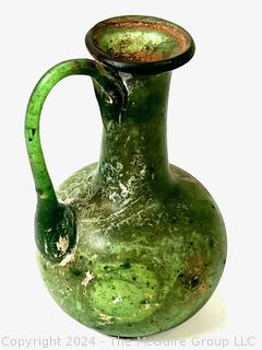 Small Green Blown Glass Pitcher, Possibly of Roman Origin, Lacking Provenance.  3 1/2" tall