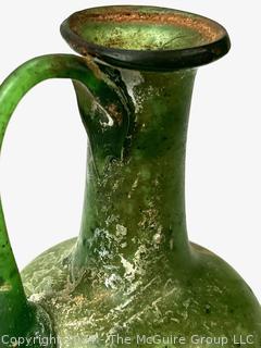 Small Green Blown Glass Pitcher, Possibly of Roman Origin, Lacking Provenance.  3 1/2" tall