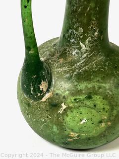 Small Green Blown Glass Pitcher, Possibly of Roman Origin, Lacking Provenance.  3 1/2" tall