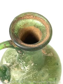 Small Green Blown Glass Pitcher, Possibly of Roman Origin, Lacking Provenance.  3 1/2" tall