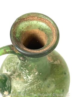 Small Green Blown Glass Pitcher, Possibly of Roman Origin, Lacking Provenance.  3 1/2" tall