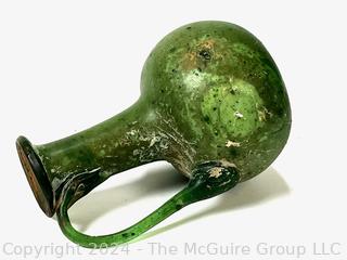 Small Green Blown Glass Pitcher, Possibly of Roman Origin, Lacking Provenance.  3 1/2" tall