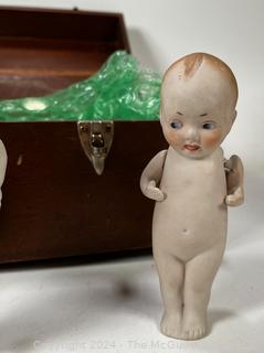 Wooden Box Full of Articulated Porcelain Dolls 