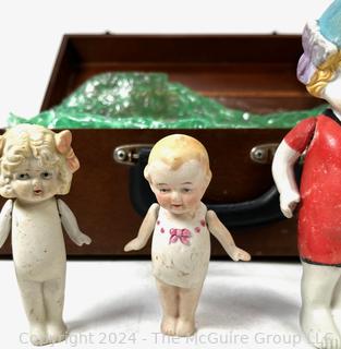 Wooden Box Full of Articulated Porcelain Dolls 