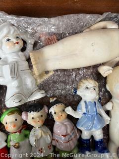 Wooden Box Full of Articulated Porcelain Dolls 