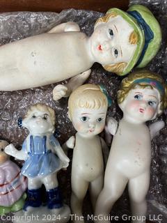 Wooden Box Full of Articulated Porcelain Dolls 