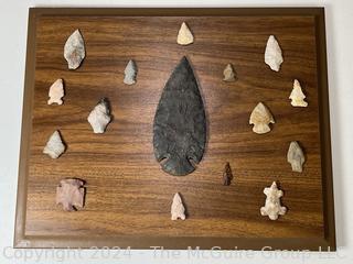 Native American Spear Point, Arrowheads and Fetishes Mounted on a Wood Plaque.