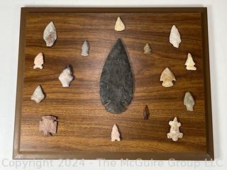 Native American Spear Point, Arrowheads and Fetishes Mounted on a Wood Plaque.