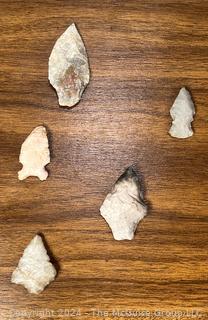 Native American Spear Point, Arrowheads and Fetishes Mounted on a Wood Plaque.