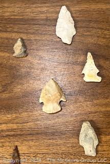 Native American Spear Point, Arrowheads and Fetishes Mounted on a Wood Plaque.